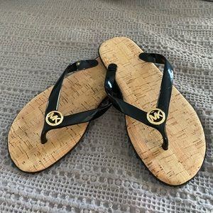Michael Kors black patent thongs
